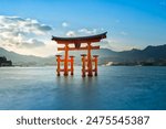 Long exposure of Floating Torii gate of Itsukushima Shrine at Miyajima, Hiroshima (gate sign reads Itsukushima Shrine)