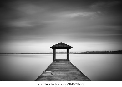 Long exposure image of a Jetty. Image a bit noise due to long exposure technique - Powered by Shutterstock