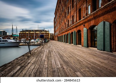 Long exposure of The Inn at Henderson's Wharf along the waterfront in Fells Point, Baltimore, Maryland