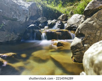 Long Exposure Landscape Of Water And Rocks