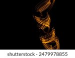 Long exposure light painting photography, curvy lines of vibrant neon metallic yellow gold against a black background. High quality photo