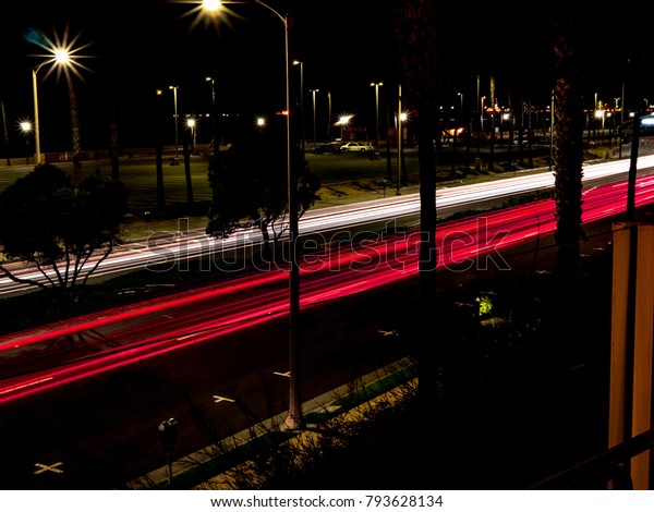 Long Exposure light\
rays from passing cars