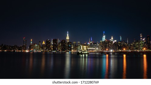 Long Exposure Of The New York City Skyline Shot From North Brooklyn In The Middle Of The Night.