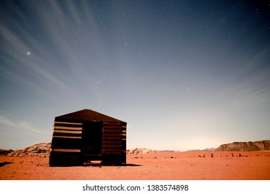 Long Exposure Night Photography Of Bedouin Tent Camp In Wadi Rum Desert In Jordan