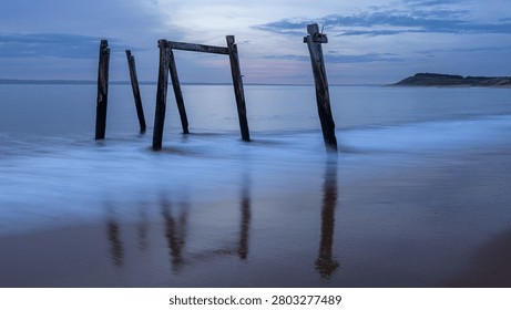 Long exposure of old, broken down pier.