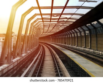 Long Exposure On Elevated Train At The Sunset