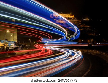 Long exposure on lights motions to create neon wave light effects - Powered by Shutterstock