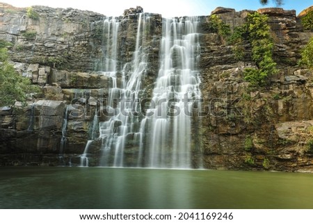 A long exposure photo of Bhimlat waterfall in rajasthan without people