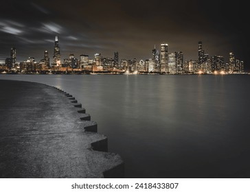 Long exposure photo of Chicago skyline at night - Powered by Shutterstock