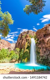 Long Exposure Photo At Havasupai Waterfalls During Summer. Beautiful Vacation Escape To The Peace Of Nature.