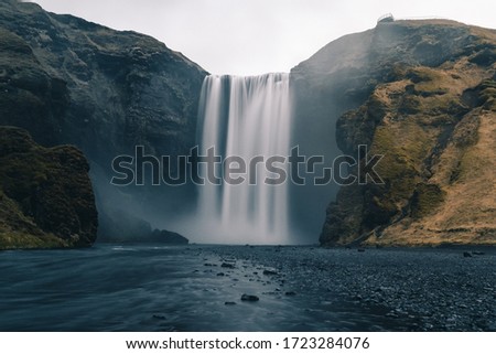 A long exposure photo of Icelandic waterfall called Skogafoss during the COVID outbreak without people