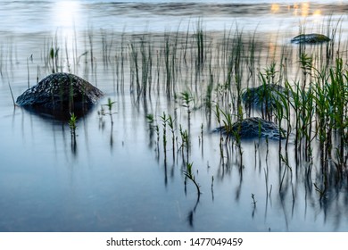 Long Exposure Photo Of Stones In The River.