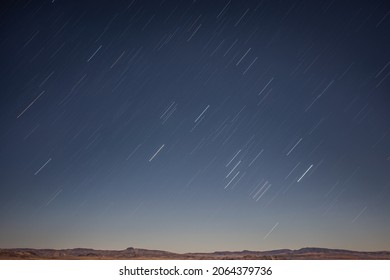 A Long Exposure Photograph Creating Star Trails Over The Black Rock Desert In Remote North West Nevada.