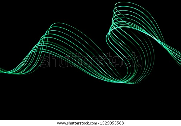 Long exposure photograph of neon green\
colour in an abstract swirl, parallel lines pattern against a black\
background. Light painting\
photography.