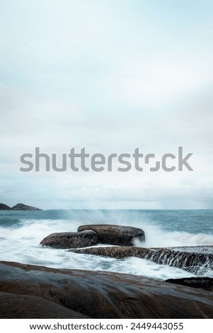 Similar – Image, Stock Photo Beach with orange rocks in a sunset, ribadeo, lugo, galician, spain