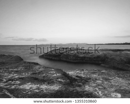 Similar – Foto Bild Strand mit Felsen und Pfütze im Sonnenuntergang, Ribadeo, Lugo, Galizien, Spanien