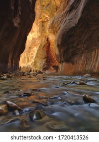 Long exposure shot with flowing river in Zion National Park Narrows, Utah, USA