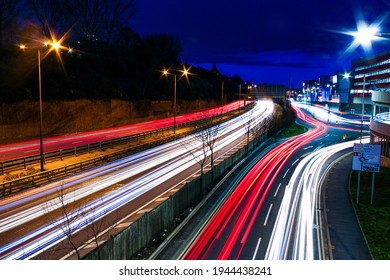 A long exposure shot of traffic travelling along the M60 and Great  Egerton Street from top of the bride on Wellington Road North, Stockport.