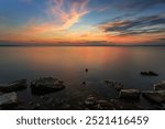 Long exposure sunrise over the lake, soft focus