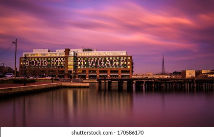 Long exposure at sunset of Bond Street Wharf in Fells Point, Baltimore, Maryland.