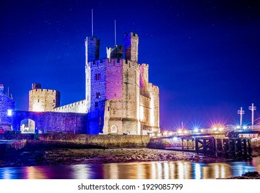 Long Exposure View Of Caernarfon Castle, A Medieval Fortress In Caernarfon, Gwynedd, North-west Wales, UK