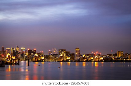 Long Exposure View Of Canary Wharf And Thames Barrier In London, UK