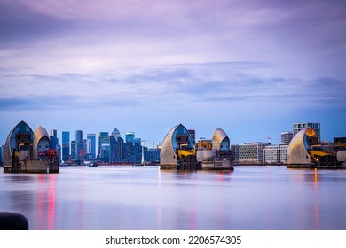 Long Exposure View Of Canary Wharf And Thames Barrier In London, UK