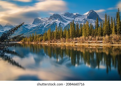 Long Exposure View Of Canmore Mountains And River