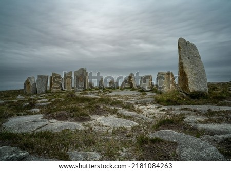 A long exposure view of the historic megalith site of Tobar Dherbhile on the Mullet Peninsula of County Mayo in Ireland