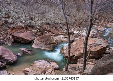 Long Exposure View Of Water Stream Flowing Through The Zion Valley