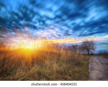 Long exposure work during sunsrise. Motion of clouds