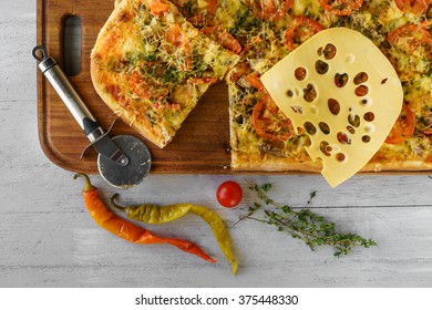 Long Fresh Pizza On A Board