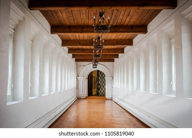 Long gallery corridor built in classical style, perspective in architecture.