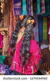 Long Hair Of Long-necked Karen Woman Wearing Tribal Jewelry And Brass Rings On The Neck At Chiang Rai, Thailand.