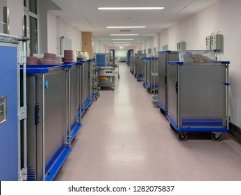In A Long Hallway In A Modern Hospital Food Trolleys Are Ready. Concept: Health And Diet
