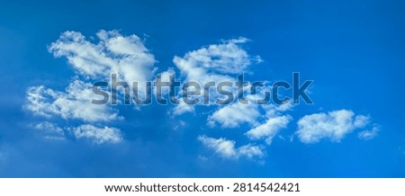A long horizontal cloud floating across the endless sky. Detailed texture of steam and evaporating moisture. A lone raindrop volumetric soft structure.