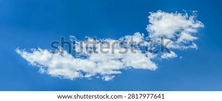 A long horizontal cloud floating across the endless sky. Detailed texture of steam and evaporating moisture. A lone raindrop volumetric structure.