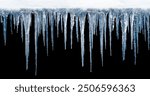 Long icicles on black isolated background