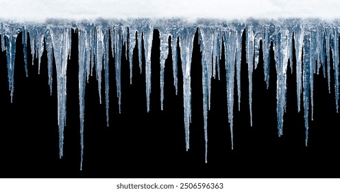 Long icicles on black isolated background