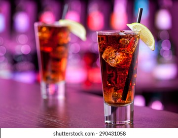 Long Island Iced Tea Cocktail Shot On A Bar Counter