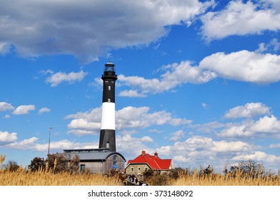 Long Island, New York, USA - August 21, 2014: Lighthouse And House