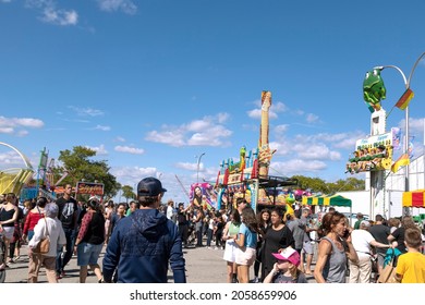 Long Island, New York, USA-September 26, 2021 A Carnival With Rides And Crowds 