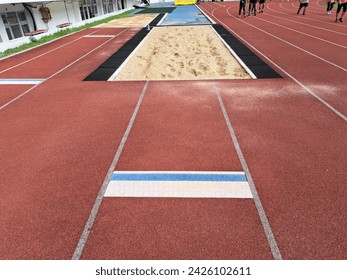 Long jump track on an athletic field - Powered by Shutterstock