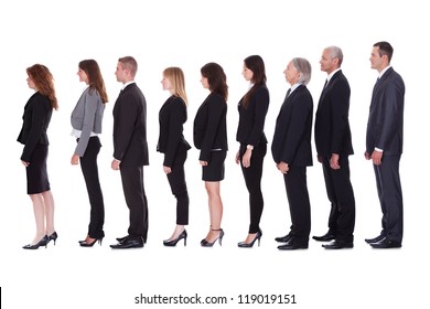 Long Line Of Diverse Professional Business People Standing In A Queue In Profile Isolated On White