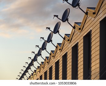 Long Line Of Parabolic Reflector Dishes On Roof Auckland New Zealand