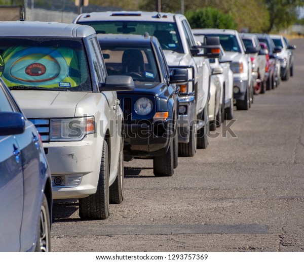 Long line of parked cars in El Paso, Texas\
28\
October 2017