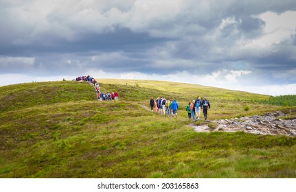 Long line of tourists in the Wicklow Mountains
