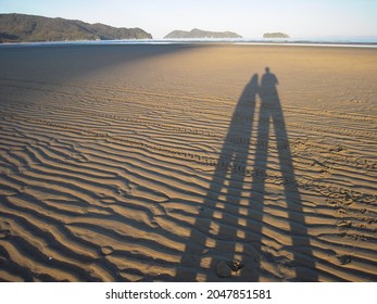 Long Lovers' Shadows In Abel Tasman, Beach