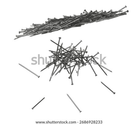Long Nail fly floating in mid air. Many group new long nails metal fall as construction tools. Abstract long nails explode unbox. White background isolated high speed shutter freeze motion