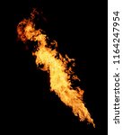 Long narrow flame isolated on black, fire stream